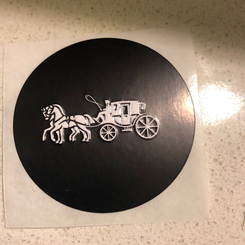 Coach emblem sticker for gift wrapping